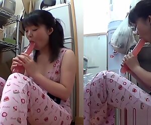 Horny asian uses dildo
