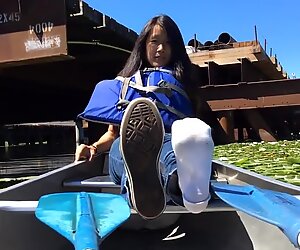 Showing feet in canoe