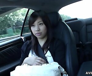 Japanese brunette Karin Asahi sucks dick in the car uncensored.