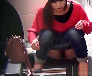 Bizarre asian whore pees in car park